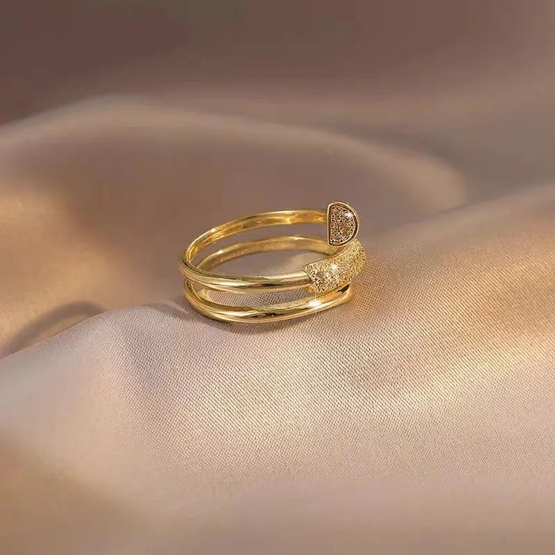 Open Metal Nail Ring with Diamonds